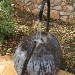 Water Fountain In The Garden - Sculpted from a large stone from Mt. Hermon | Artist Chanoch Ben Dov