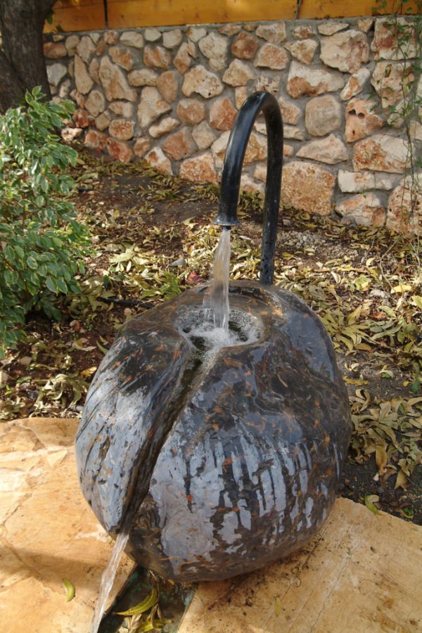 Water Fountain In The Garden - Sculpted from a large stone from Mt. Hermon | Artist Chanoch Ben Dov
